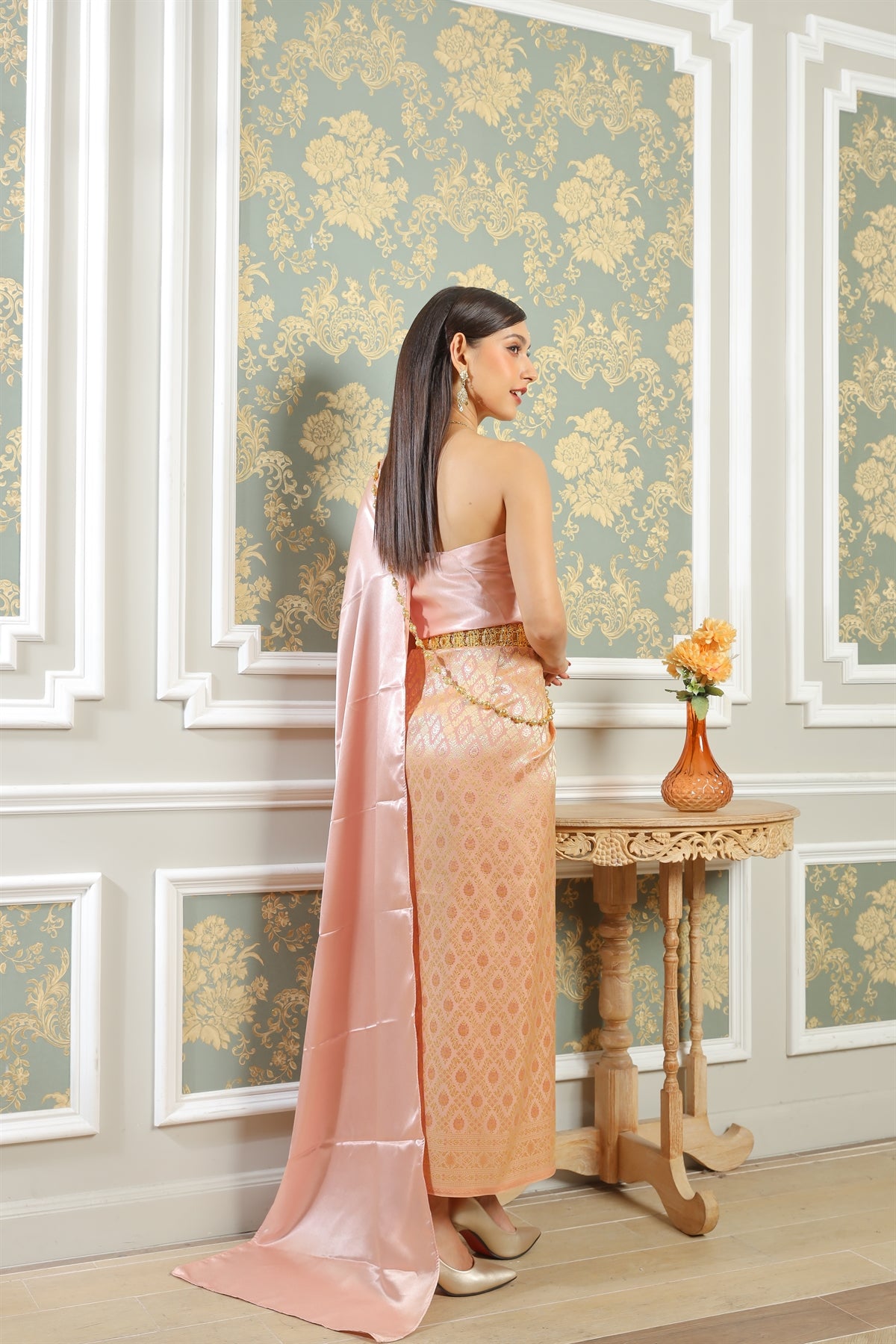 A beautiful Thai girl wearing her traditional Thai wedding dress.